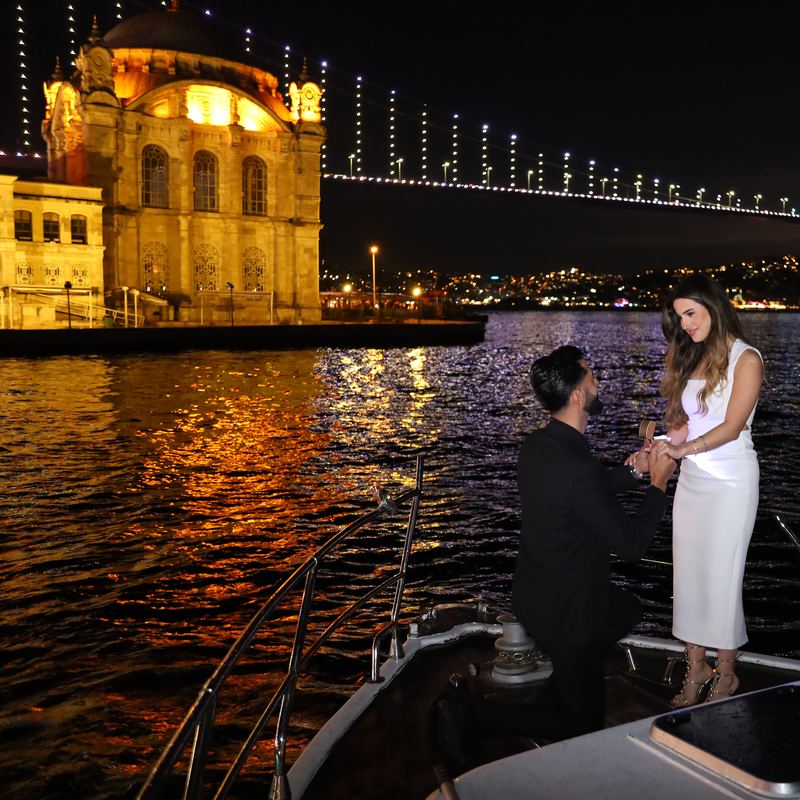 Proposal on the bow of the yacht right in front of Ortaköy Mosque